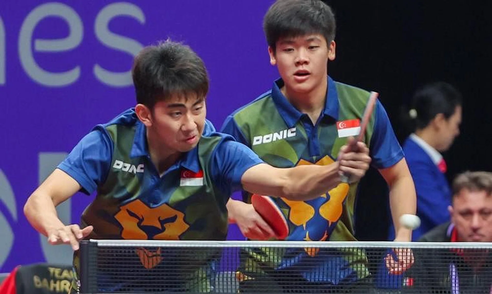 Koen Pang (left) and Izaac Quek competing in the men's doubles table tennis competition at the Hangzhou Asian Games in 2023.
