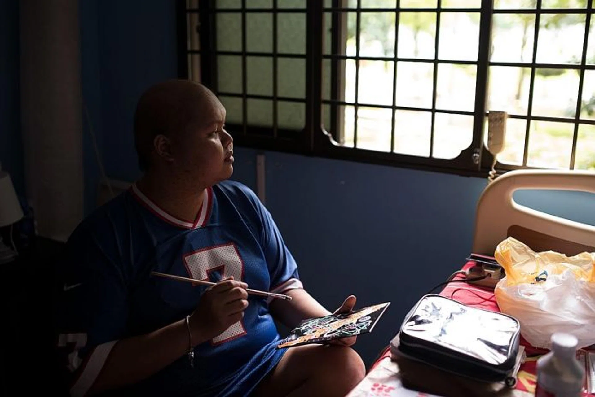 GOODBYE: Young artist Muhammad Khairul Ikhwan would paint to find solace from stage 4 colon cancer. He died on Sunday.