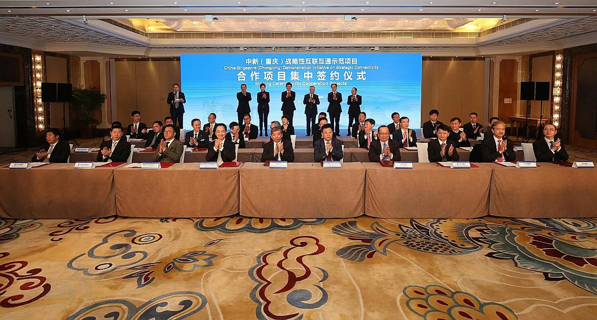 The signing ceremony of 10 commercial pacts between Singapore and Chongqing companies was witnessed by Minister in the Prime Minister's Office Chan Chun Sing. 