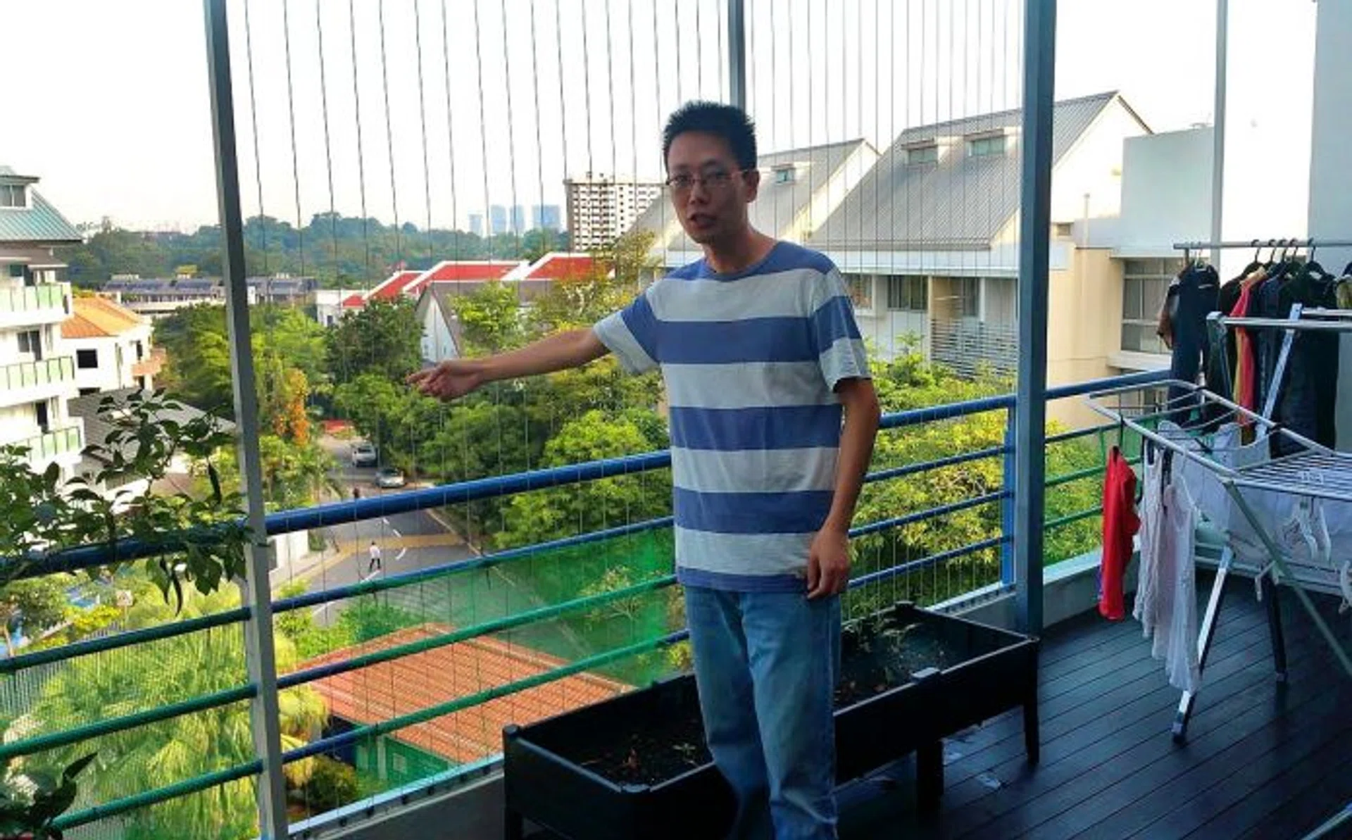 PREVENTION: He has also cable-tied sheets of green plastic mesh over the railings.