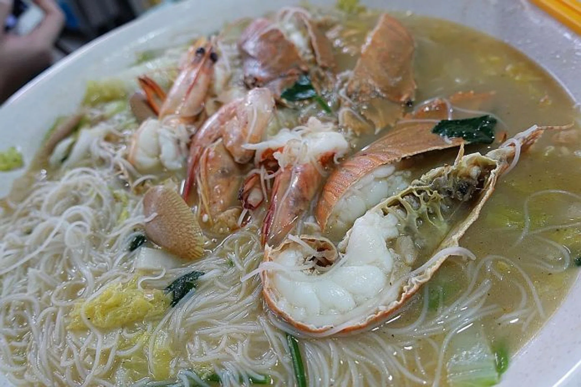 RENDITIONS: East Seafood White Beehoon's rich seafood version