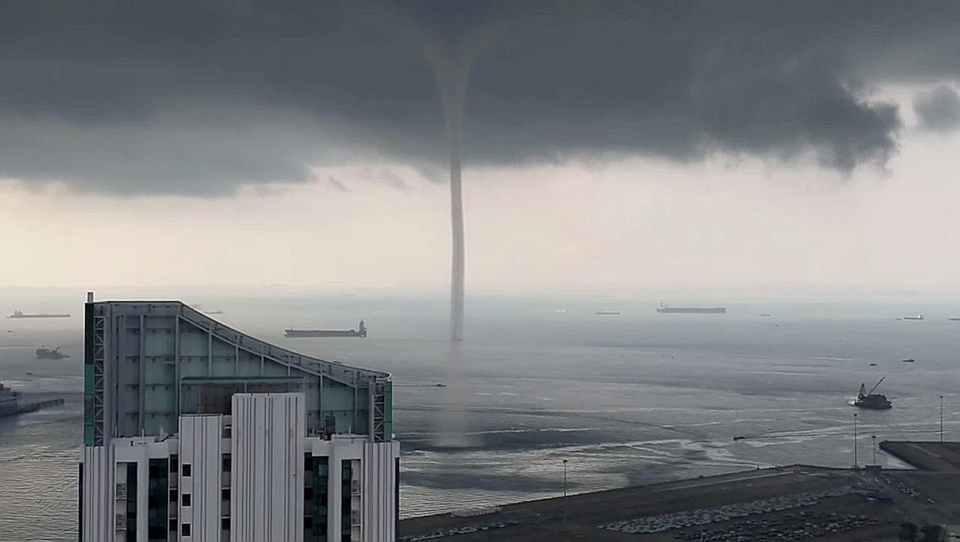 The waterspout near the Tanjong Pagar Terminal on Saturday. 