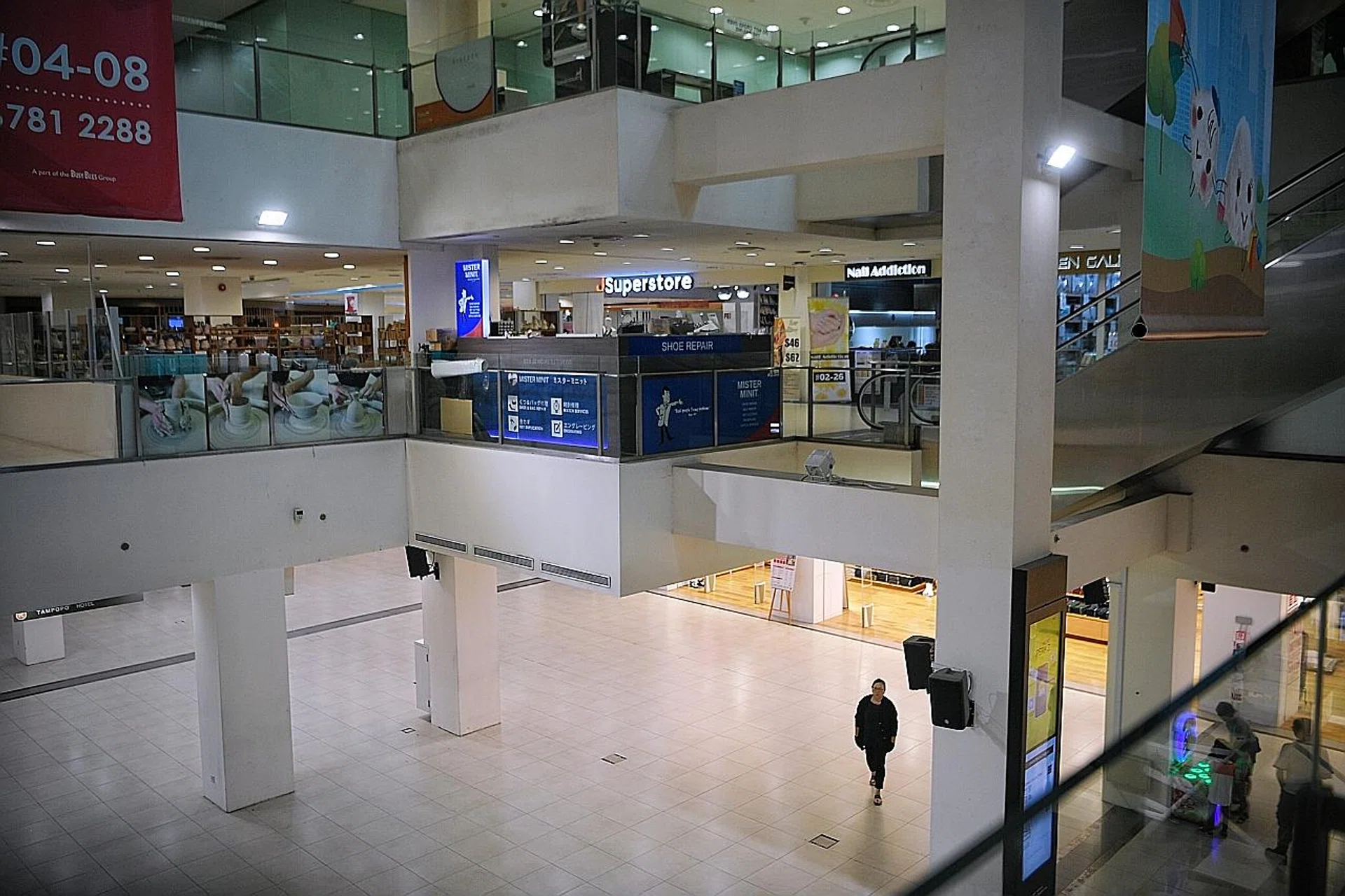 When TNP visited Liang Court last week, it was deserted (above) except for some shoppers at the basement and first level. 