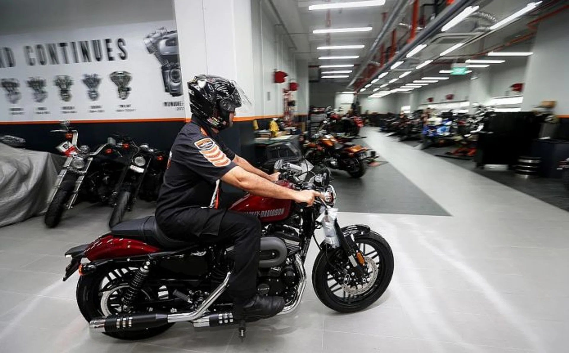 BETTER: The workshop now has more bike lifts and floor tiles with different colours to enhance safety.