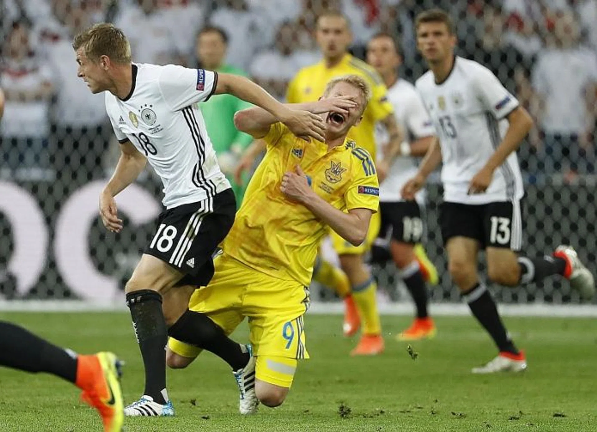 KROOS  THE CRUX: Germany's Toni Kroos getting the better of Ukraine's Viktor Kovalenko.
