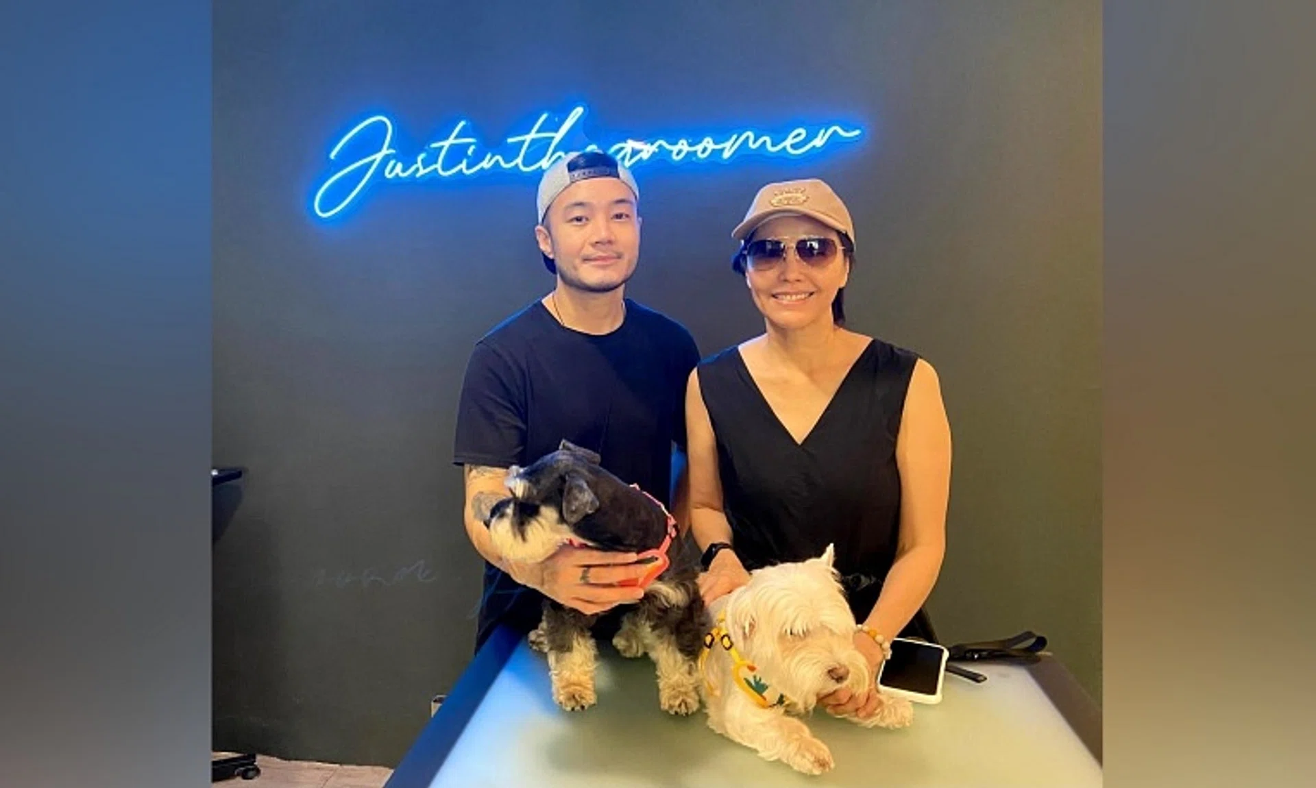Mr Justin Tan, who runs pet grooming shop Justin The Groomer, with one of his celebrity clients, actress Zoe Tay.