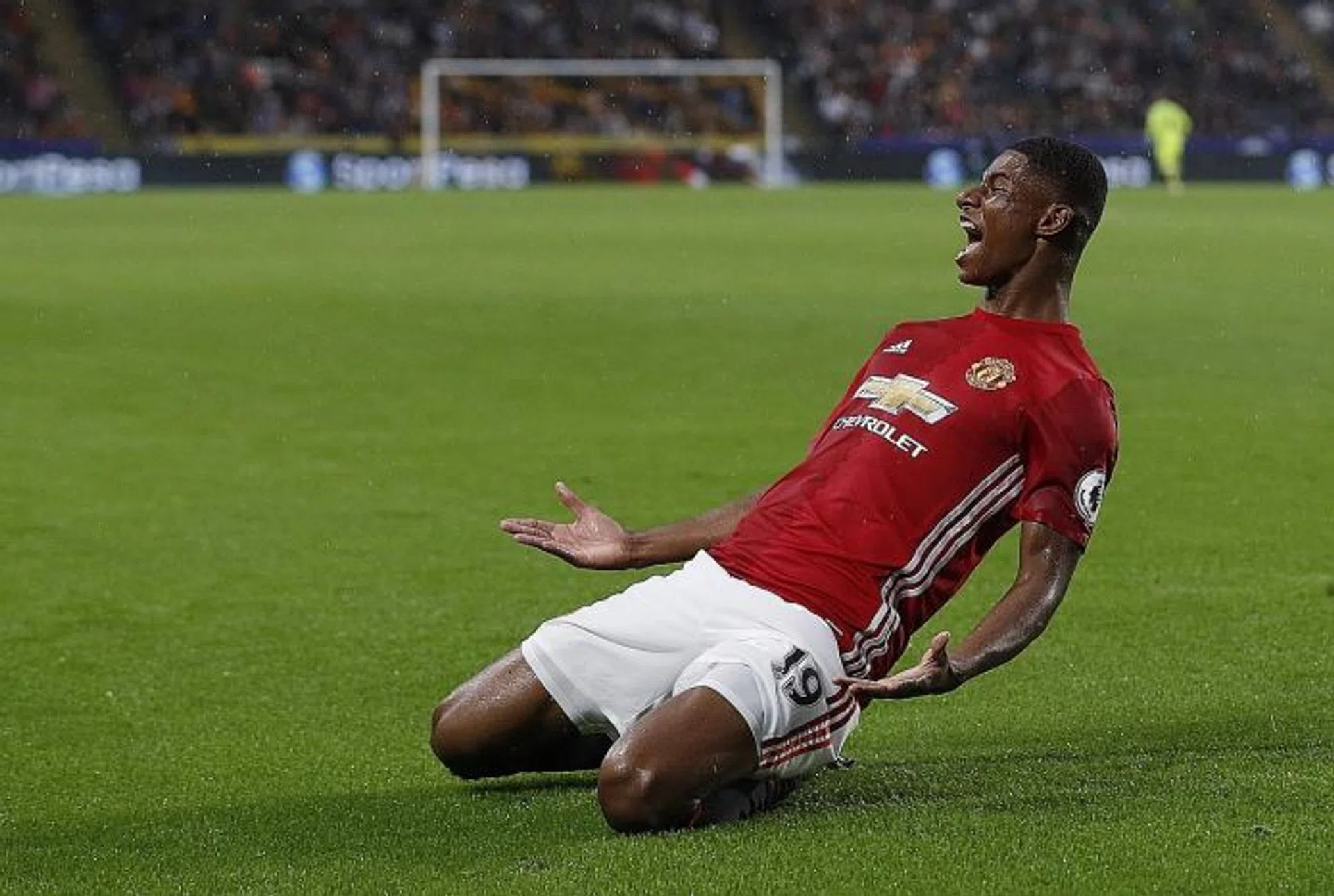 ON SONG: Manchester United striker Marcus Rashford celebrating his late winner against Hull. In midweek, he scored a hat-trick for the England Under-21 side.