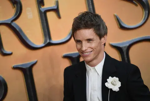 'Euphoric' Eddie Redmayne premieres third Fantastic Beasts movie
