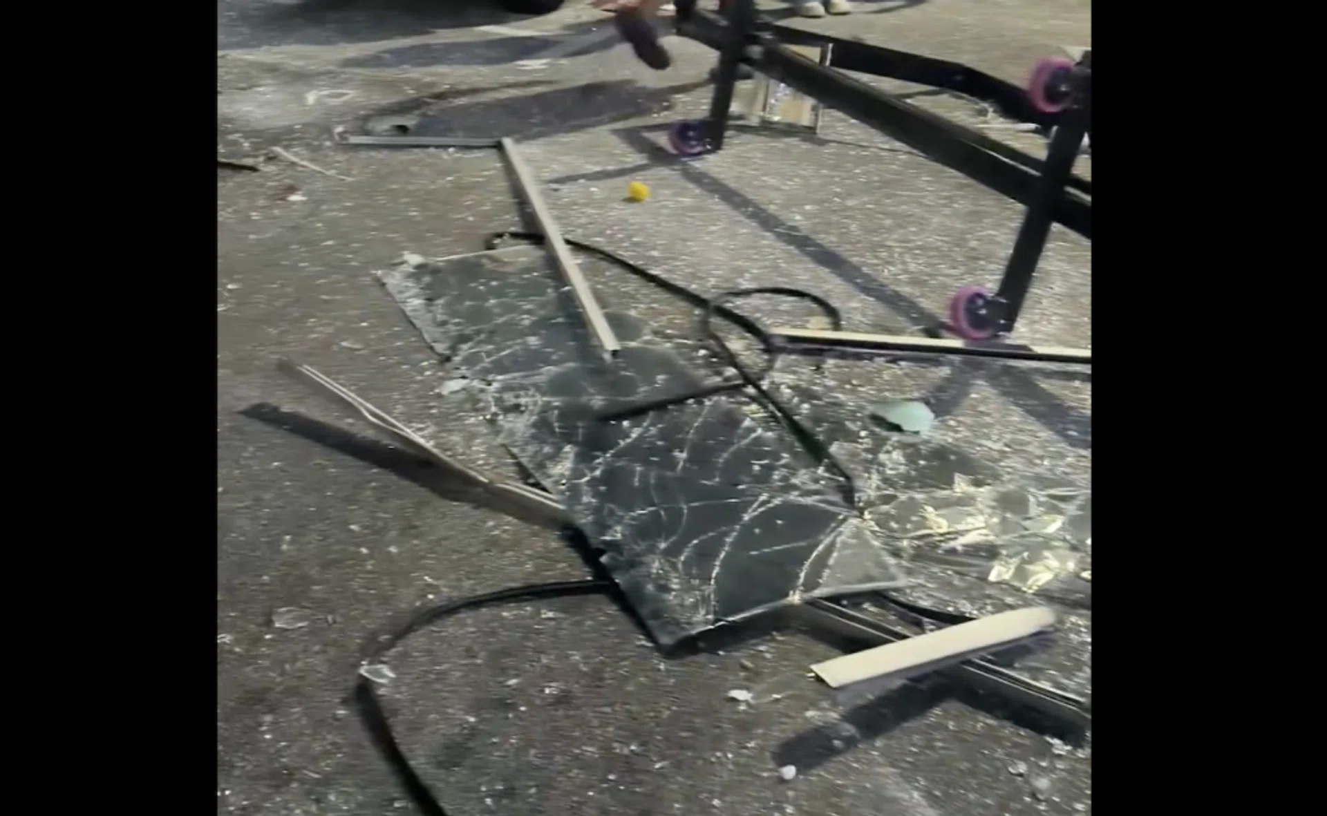 There were glass shards scattered on the ground after the blast.
