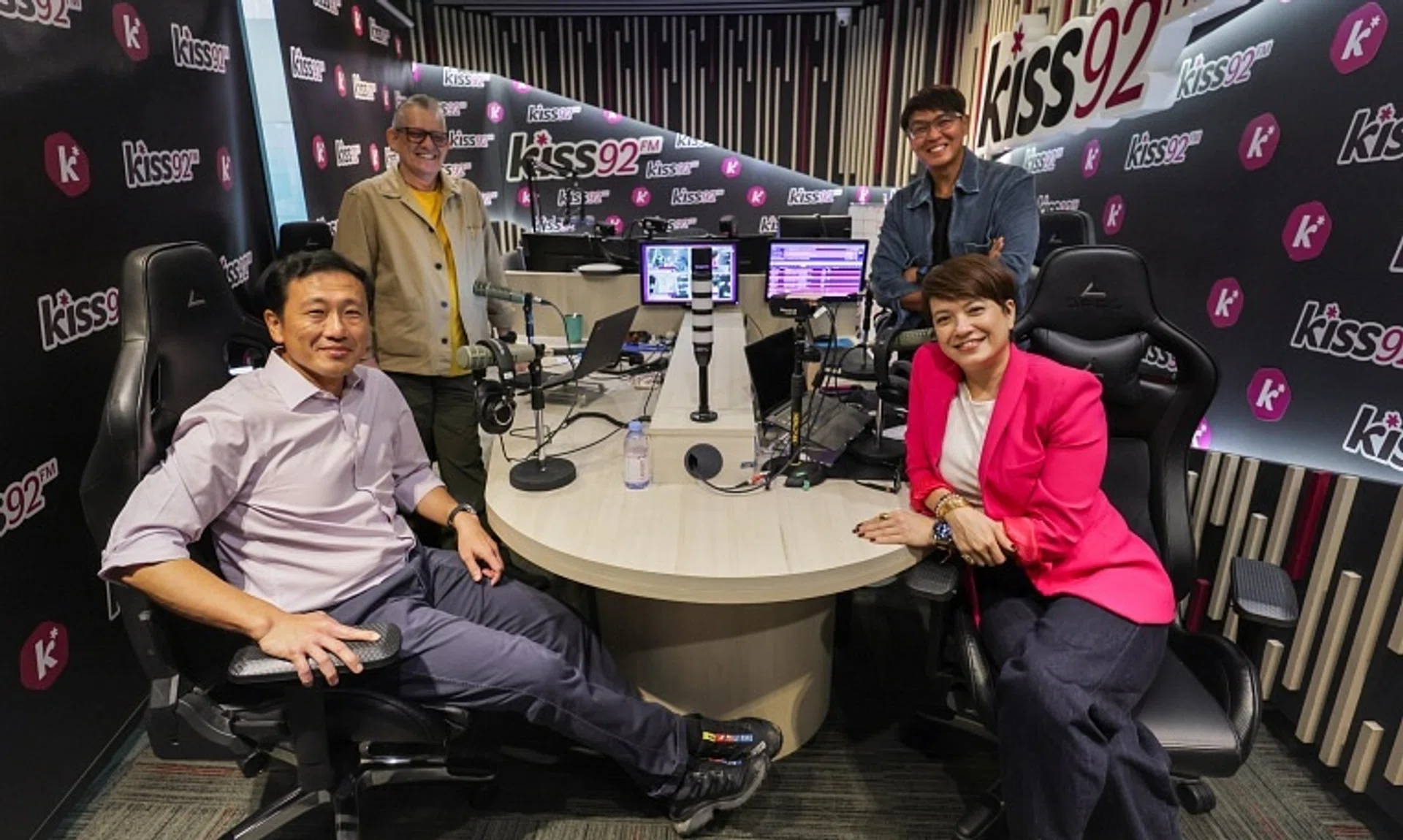 (From left) Health Minister Ong Ye Kung with Kiss92 radio hosts The Flying Dutchman, Glenn Ong and Angelique Teo.