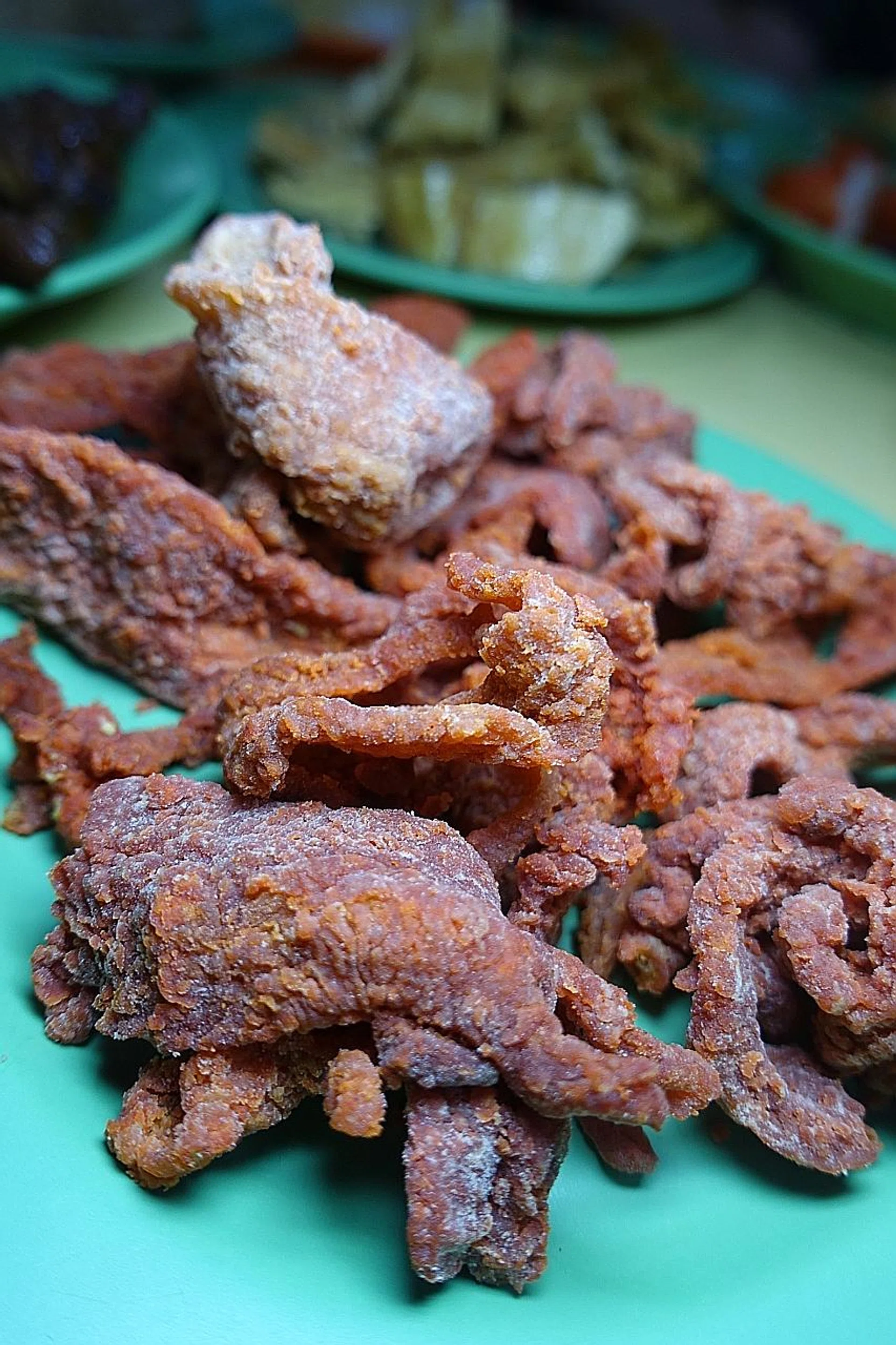 (Above) The sinfully oily red pork chops at Siak Ann Cooked Food. 