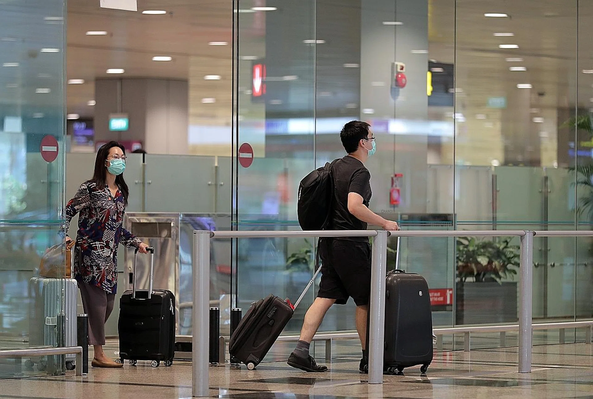 Under current rules, travellers entering Singapore are required to bear the full cost of medical treatment, tests and isolation. 