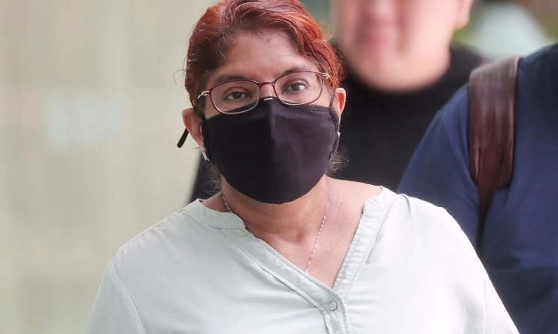 K. Santhi had claimed trial to two counts of voluntarily causing hurt to a public servant, and using criminal force to a public servant.