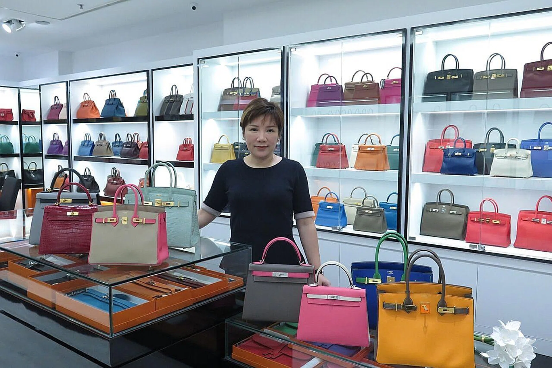 Madam Florence Low with her Hermes handbag collection at LuxLexicon's showroom at Centrepoint Shopping Centre. 