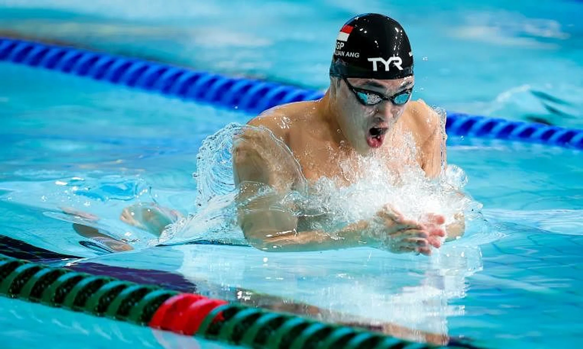 Singapore's Maximillian Ang clocked 58.10 seconds to break the short-course men's 100m breaststroke national record on Wednesday.