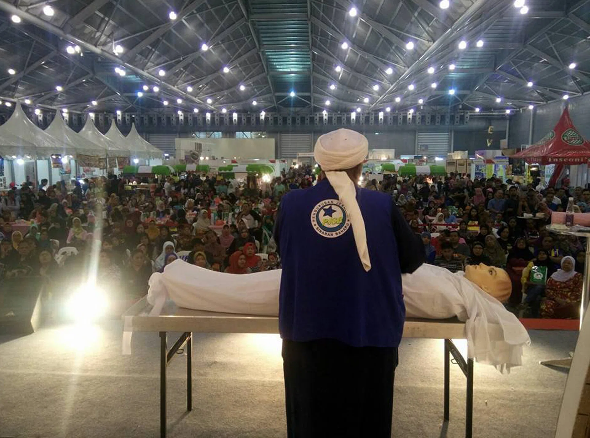 PREPARED: (Above) Mr Roslan Sambri, the director of a Muslim burial service organisation, conducting a course about burial rites for Muslims. 
