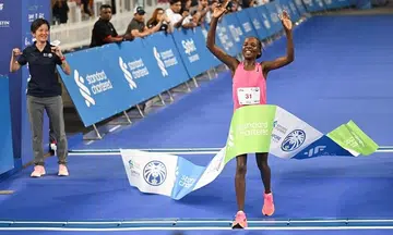 Elite runners rediscover winning feeling with StanChart Singapore Marathon titles