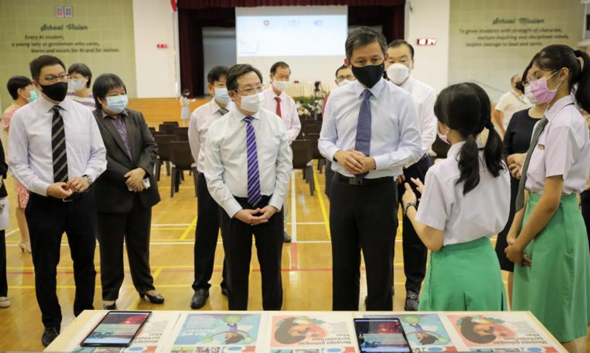 Education Minister Chan Chun Sing (fourth from left) touring the Mother Tongue language learning stations at Ahmad Ibrahim Secondary School on March 25, 2022.