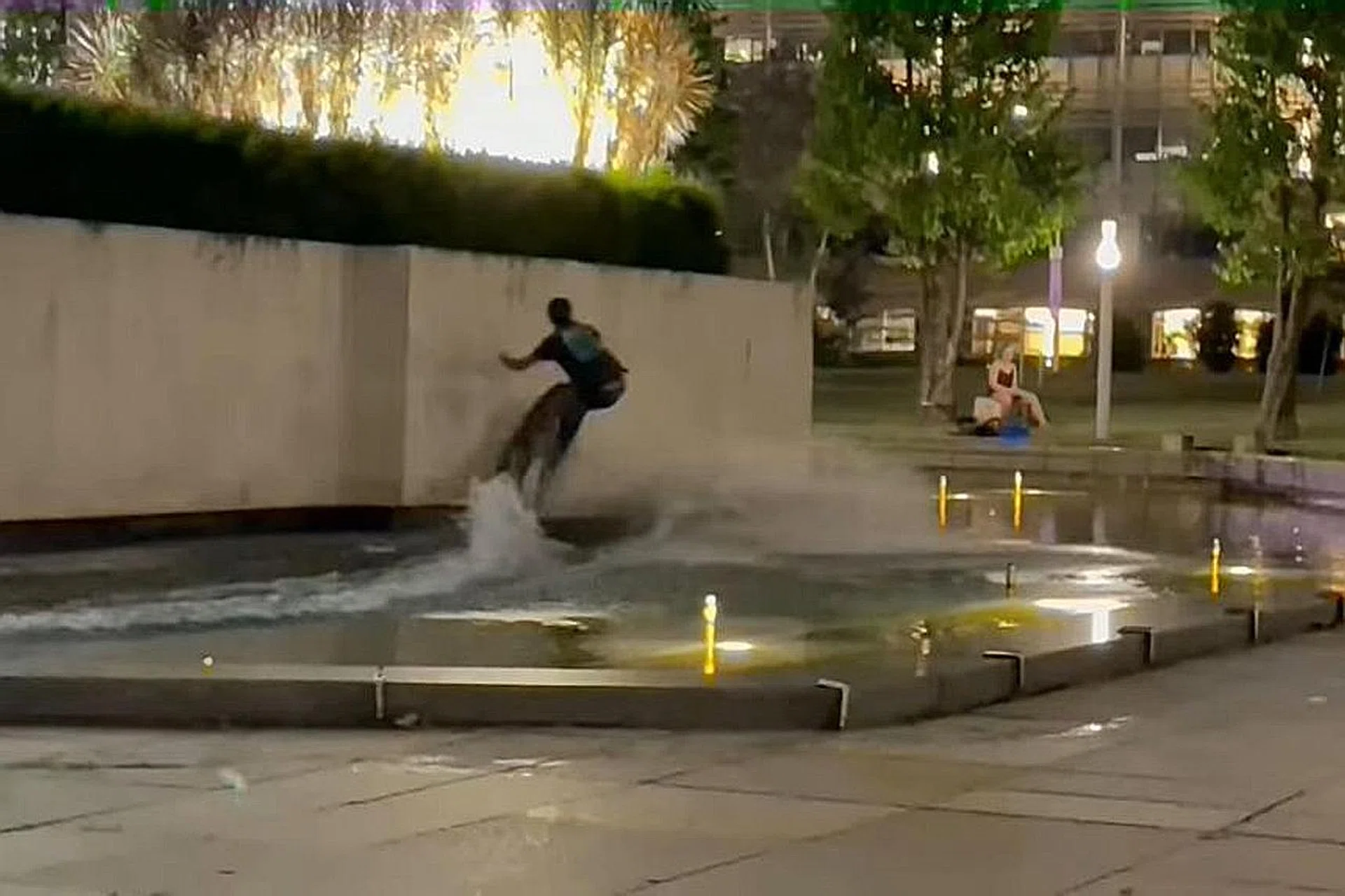 The clip of the incident shows a man surfing across the water feature at the Civilian War Memorial in Beach Road. He then performs a trick and hits his board against the side of the monument.