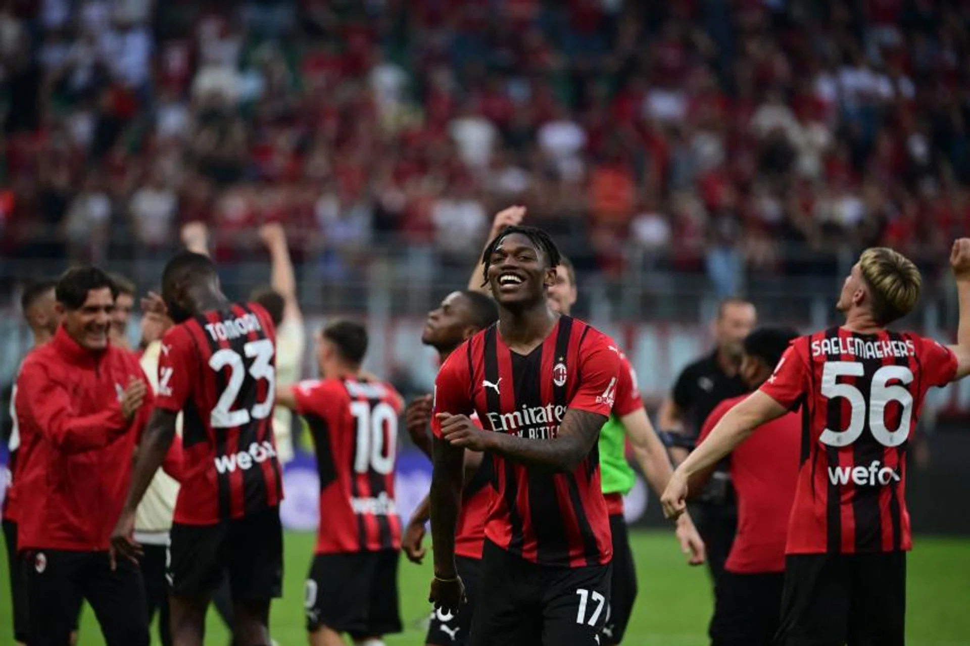 AC Milan players and Rafael Leao (centre) celebrate their 2-0 win over Atalanta, on May 15, 2022. 