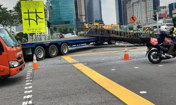 Part of Ophir Road closed after accident involving bus and trailer truck