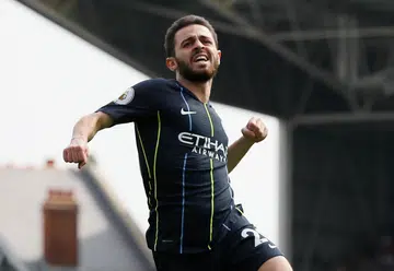 Man City back on top, Huddersfield go down