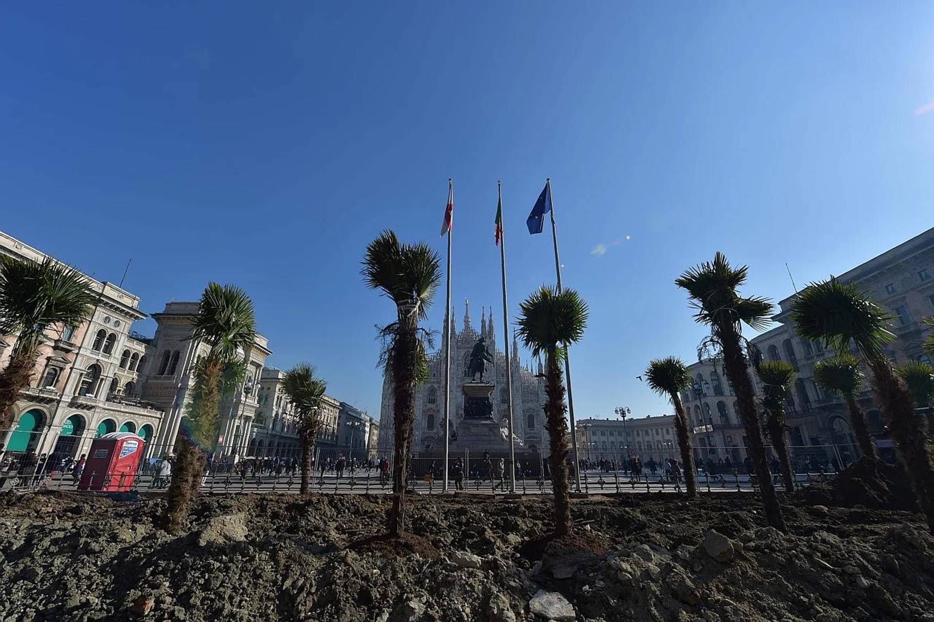 Palm trees in front of Milan's famous Duomo. 