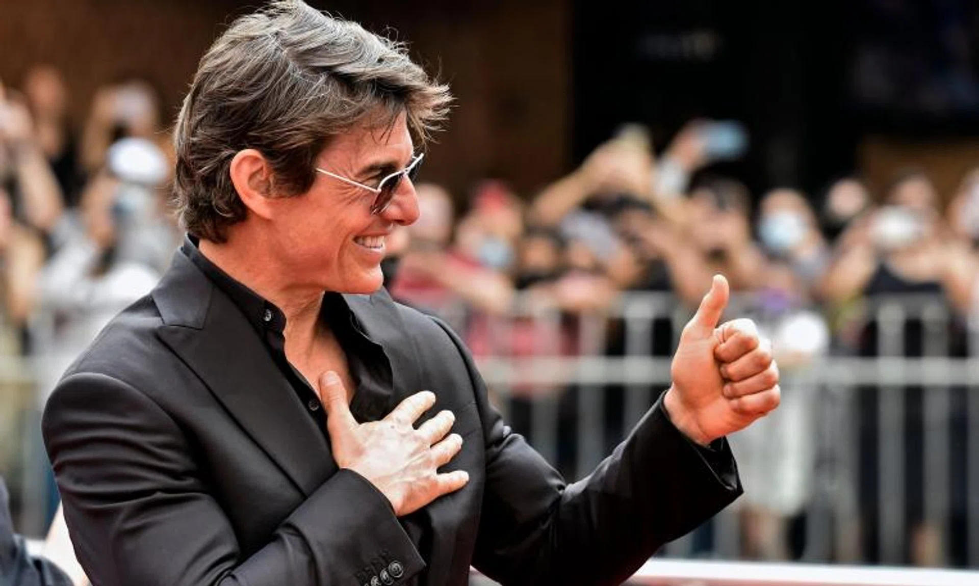 Tom Cruise gives the thumbs up as he arrives for the premiere of Top Gun: Maverick in Mexico.