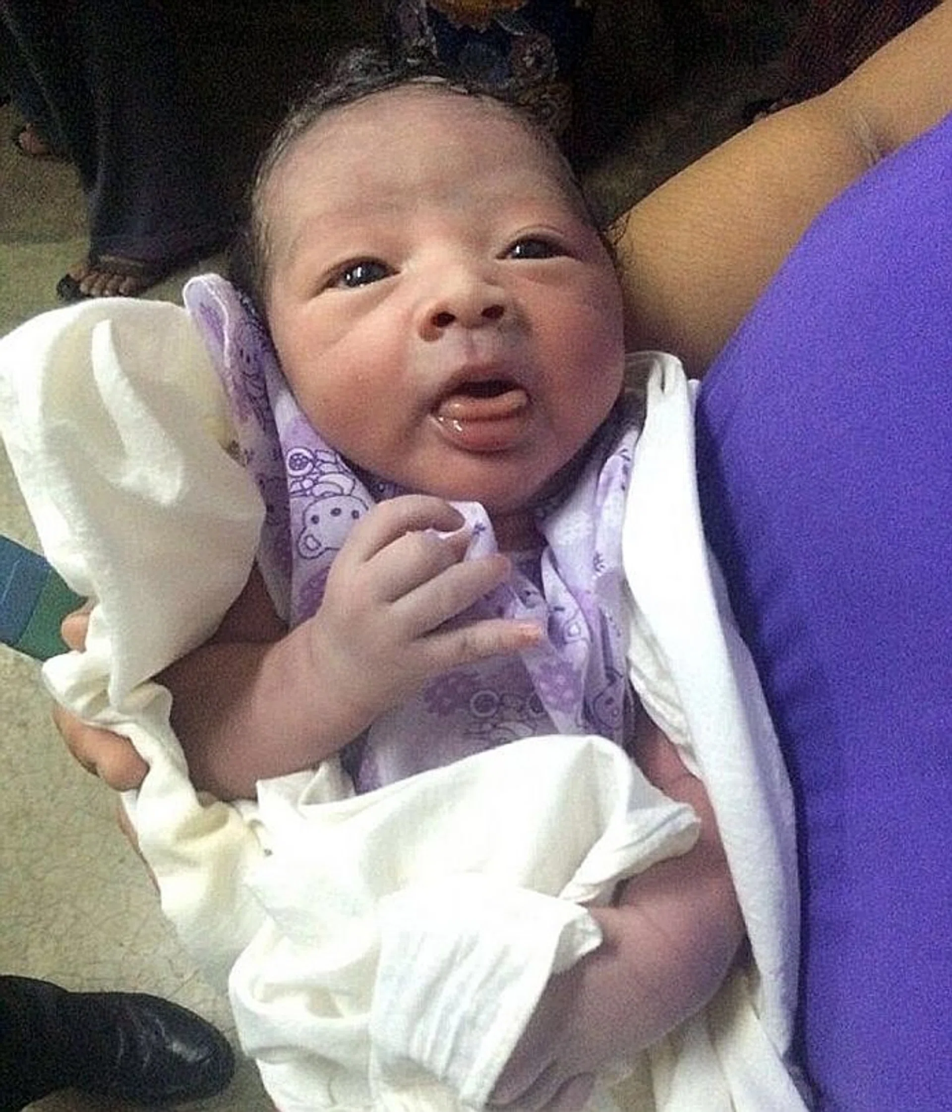 JET SET: Baby Saw Jet Star was born on board Jetstar flight 3K583 after it landed in Yangon, Myanmar, on Friday.