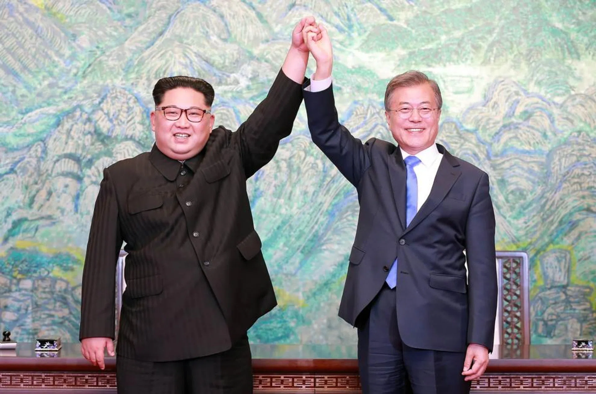 The role played by South Korean President Moon Jae In (right) in being a peace-broker with the North's leader Kim Jong Un has been hailed as being worthy of a Nobel Prize.