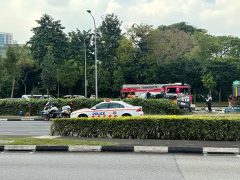 Traffic police were gradually opening up both lanes, though one of the lorries remained toppled on its side.