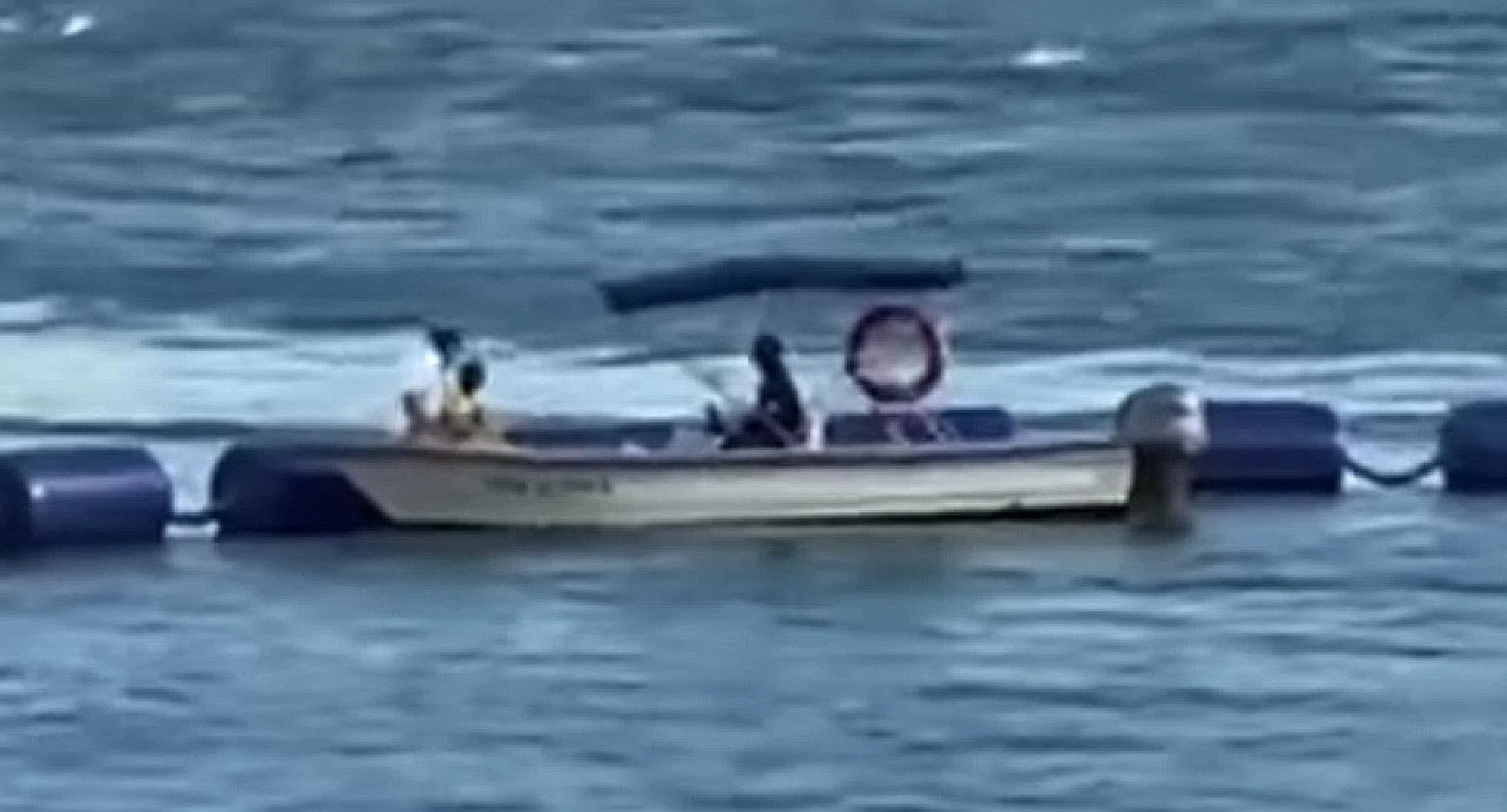The rescued woman on the boat from One15 Marina in the waters off Sentosa Cove. 
