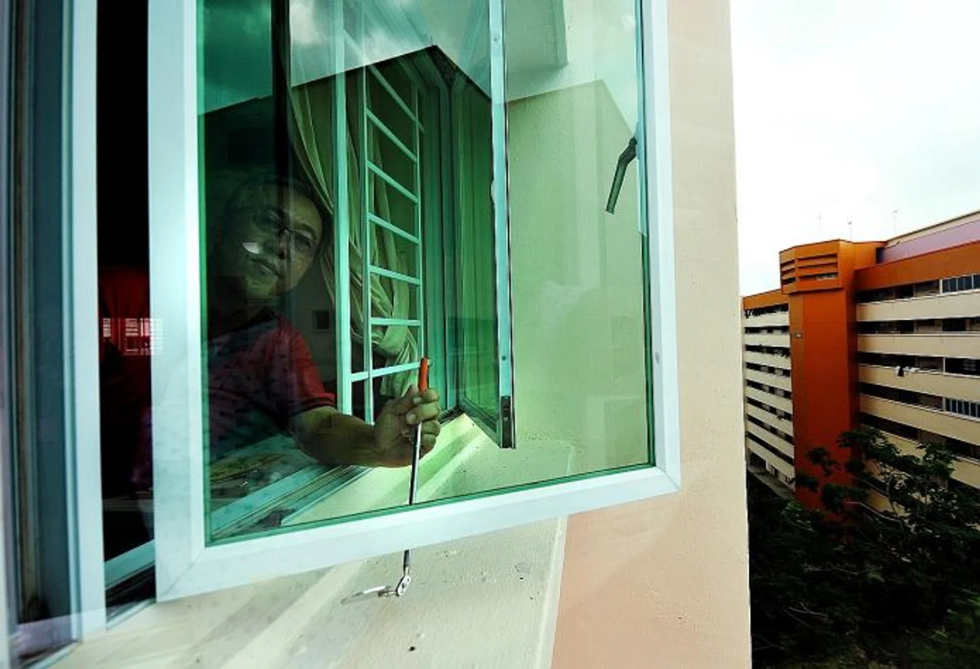 DEDICATED: Mr Lee Koon Peng will be happy only if there are zero cases of fallen windows.