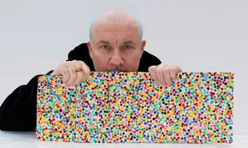Artist Damien Hirst to burn thousands of his own paintings in NFT project