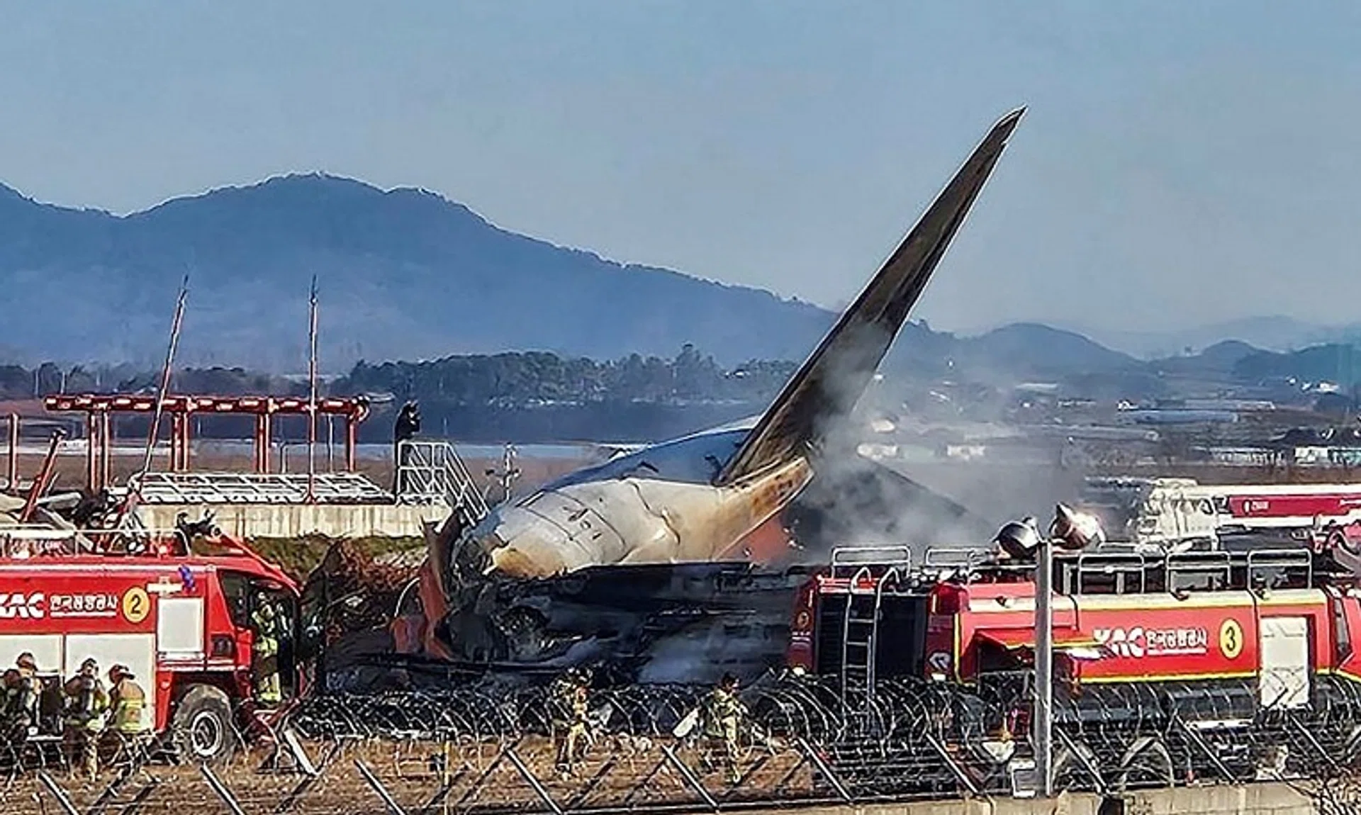 Firefighters extinguishing a fire on a Jeju Air aircraft which crashed at Muan International Airport in Jeju, South Korea on Dec 29.