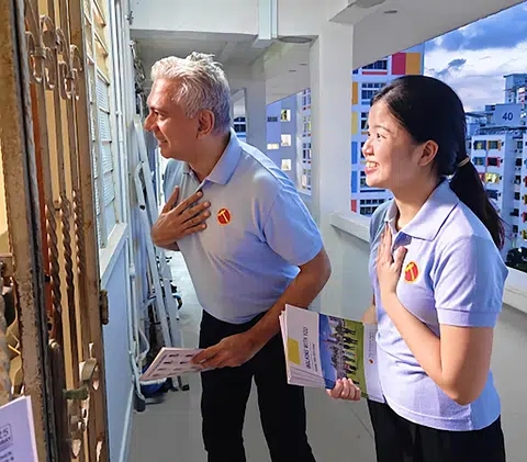 Workers' Party new face Harpreet Singh Nehal walking the ground in MacPherson in March. The senior counsel is widely regarded as the opposition party's