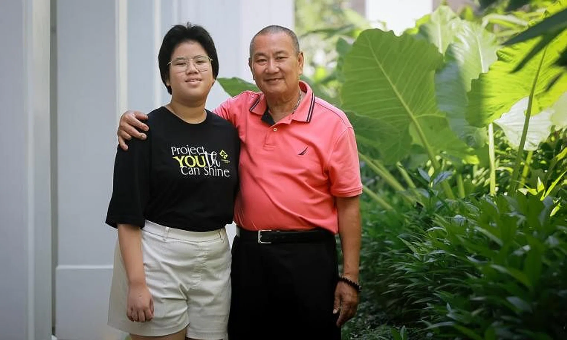 Mr Lee Kia Por with his daughter Ruby Lee Hui Ying. They received help from CDAC on multiple fronts.