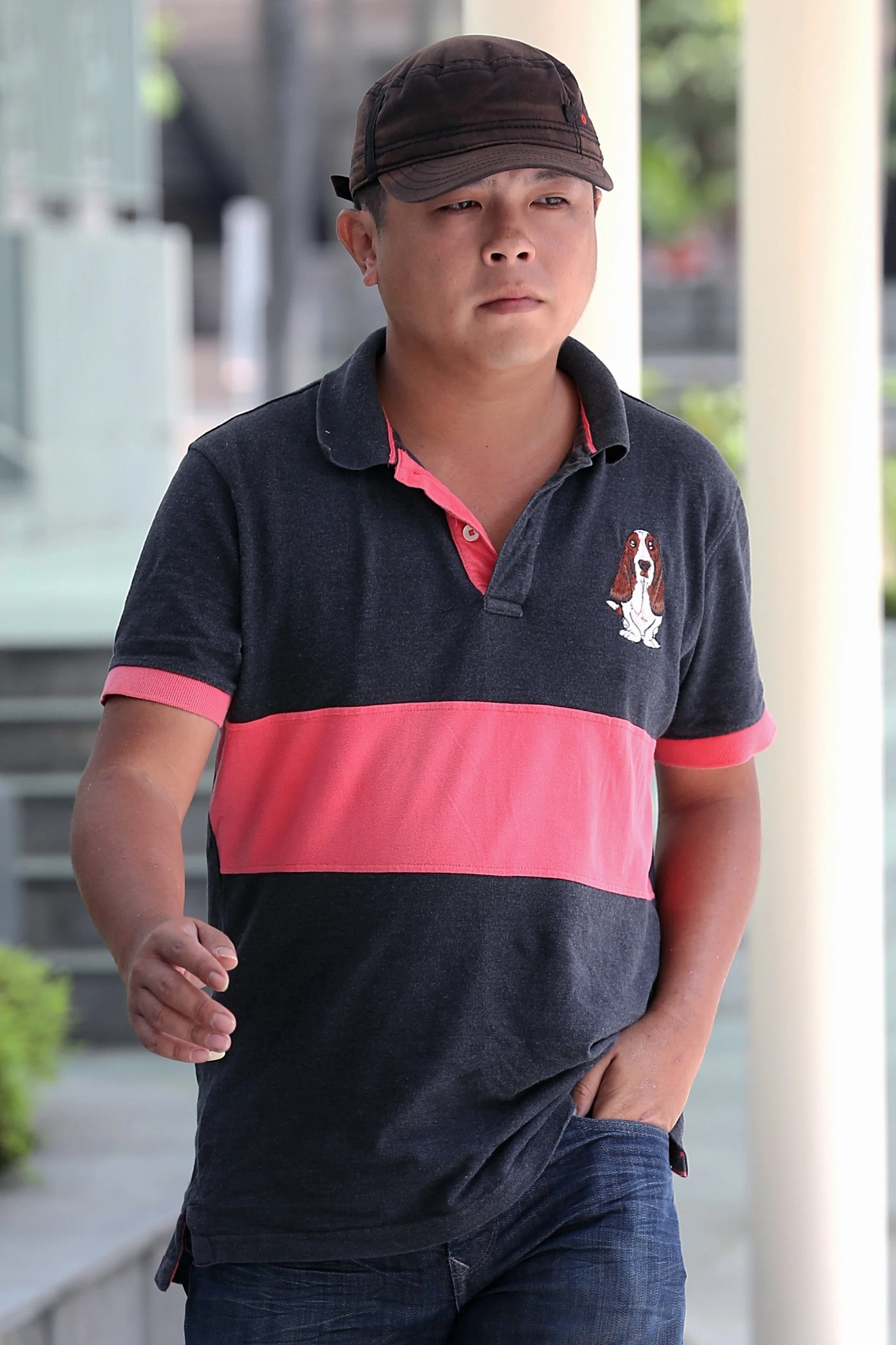 UPSET: Vietnamese tourist Pham Van Thoai was in tears when he was refused a refund after buying a phone at Jover Chew’s (above) shop.  