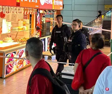 Woman arrested in alleged knife attack at People's Park Complex; 2 men taken to hospital