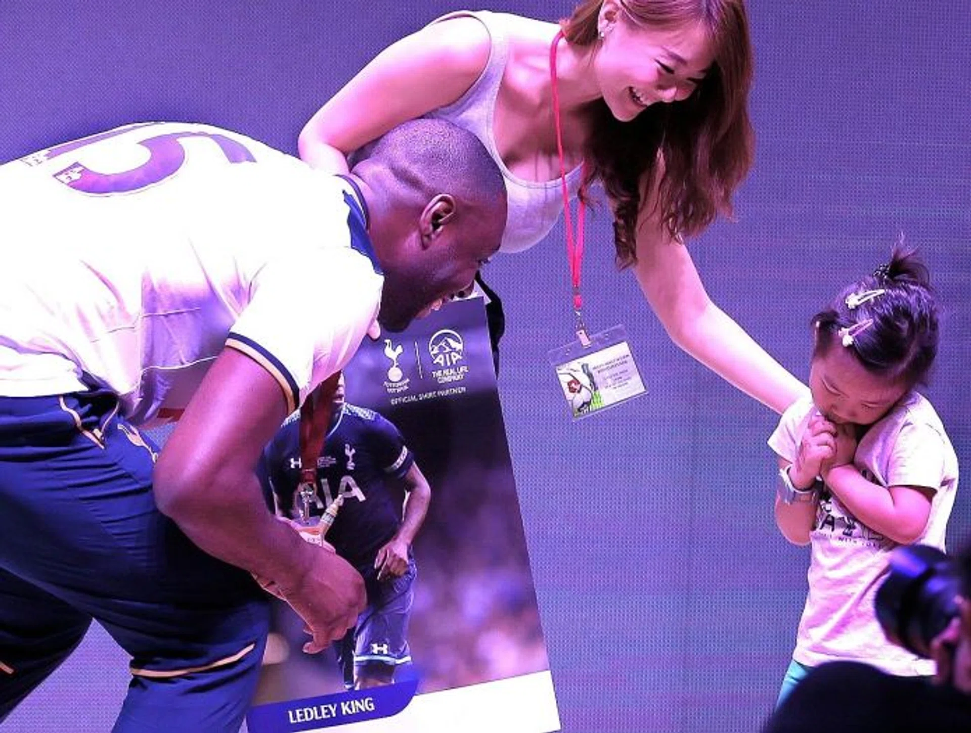 KID FRIENDLY:  Above, the ex-Spurs captain was a hit with the younger kids as well. T