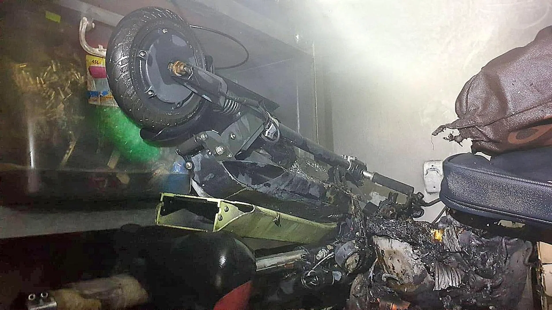 A fire inside an e-scooter shop in Lorong 19 Geylang where a PMD was being charged in the storage room at the time of the incident.