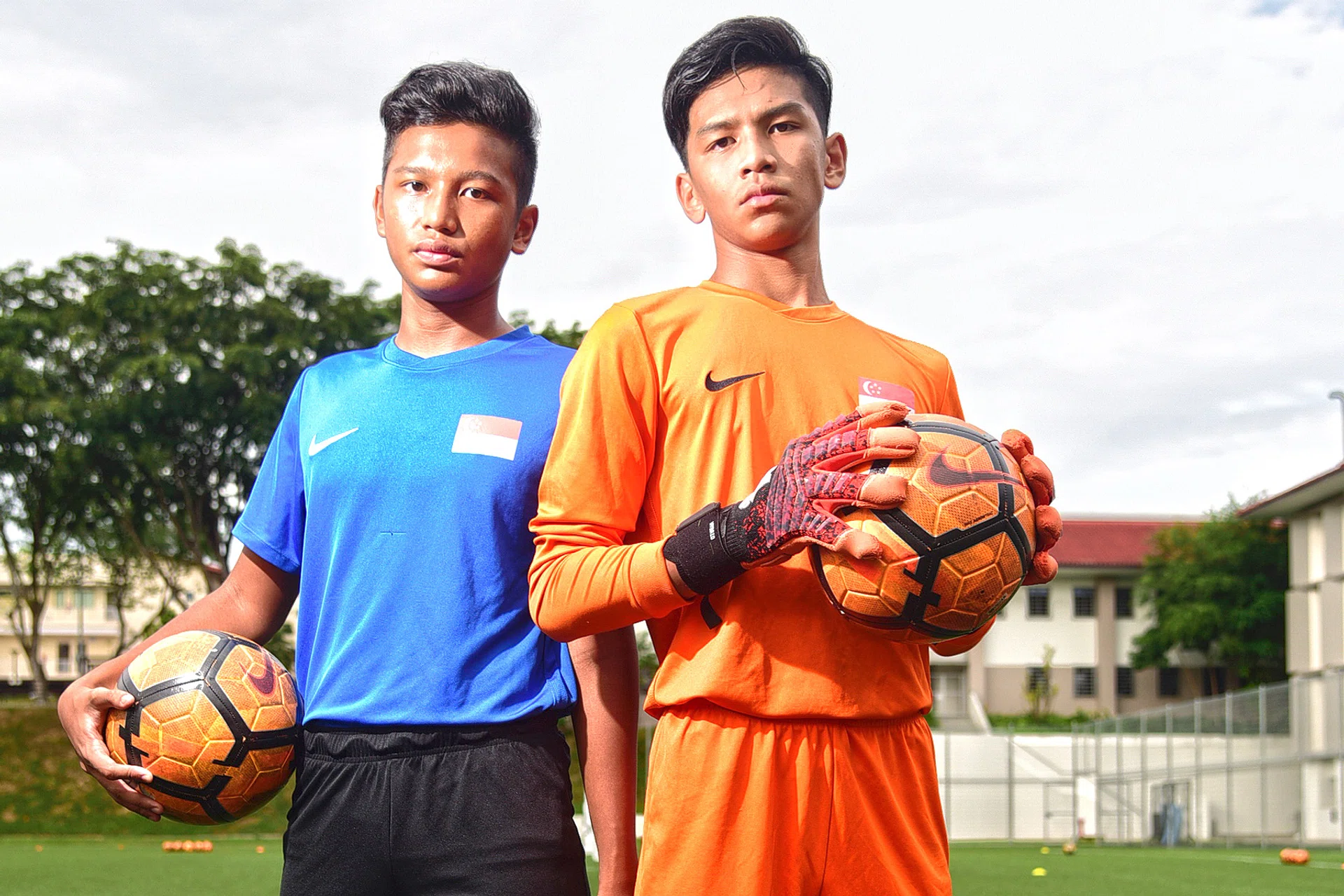 National Under-15 players Aqil (left) and Aizil Yazid both started their football careers as goalkeepers, like their father Yazid. 