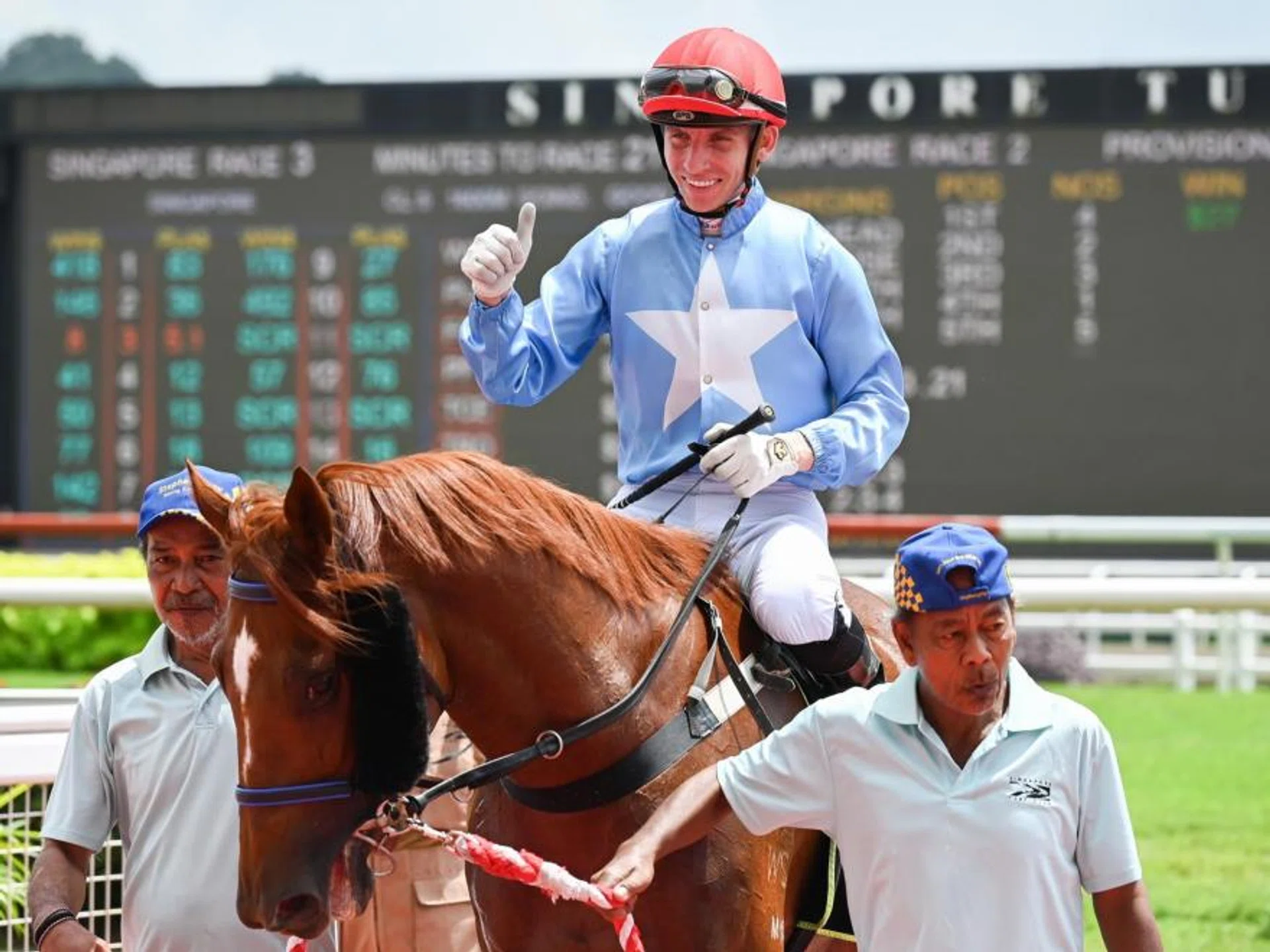 French jockey Ryan Curatolo giving the thumbs-up sign on October, the middle leg of his treble at Kranji on Jan 27. He also scored on Our Secret Weapon and Lion Spirit.