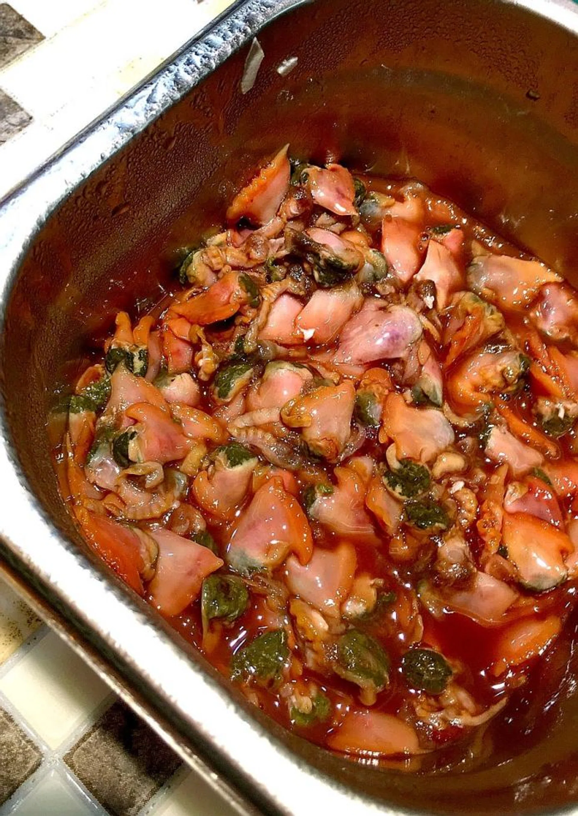 SEAFOOD: (Above) The blood cockle is an essential ingredient in char kway teow and laksa.