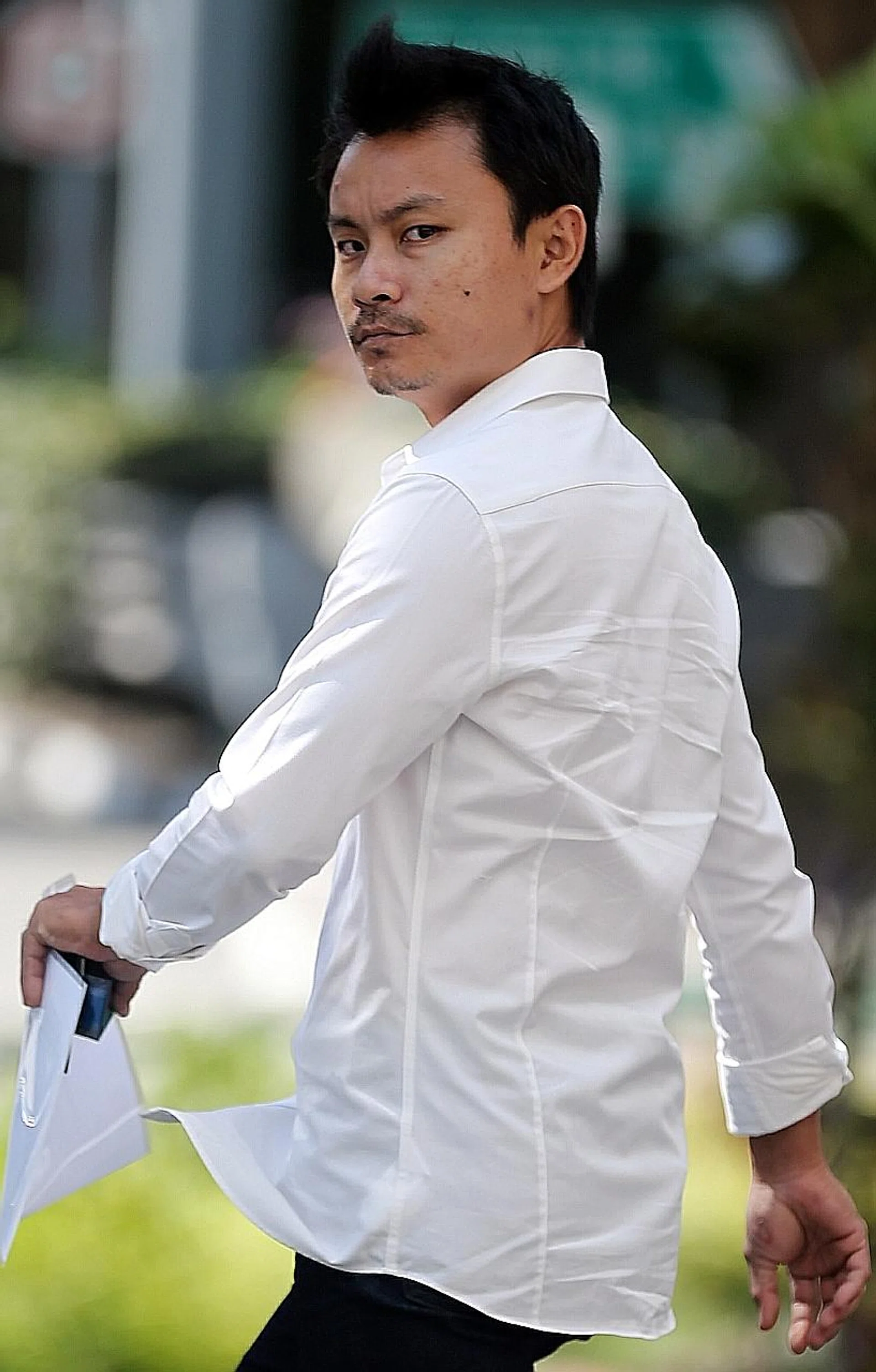 The unregistered PMDs of Samuel Tan Woon Yeow (above) and three teenagers were seized by Traffic Police officers. 