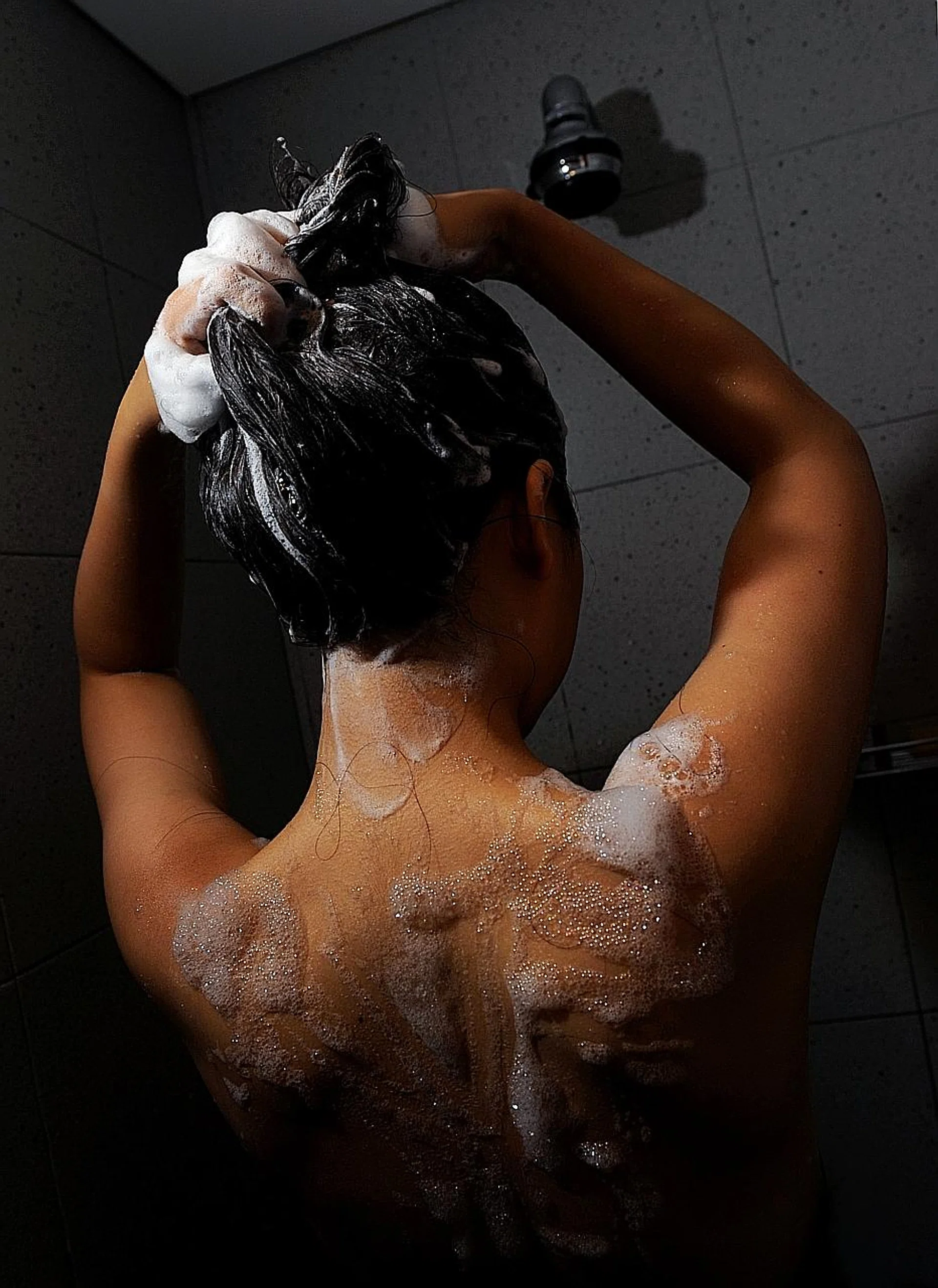 Break the habit of washing your hair every day as it strips your tresses of natural oils.