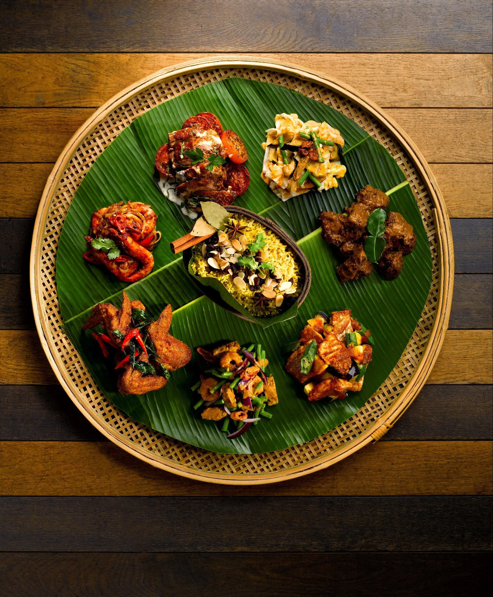 TUCK IN: The offerings from 21 On Rajah (above), Crave, Kintamani Indonesian Restaurant, Window on the Park, Katong Kitchen and Sakura International Buffet.