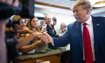 Trump promises 'food for everyone', but leaves restaurant without paying