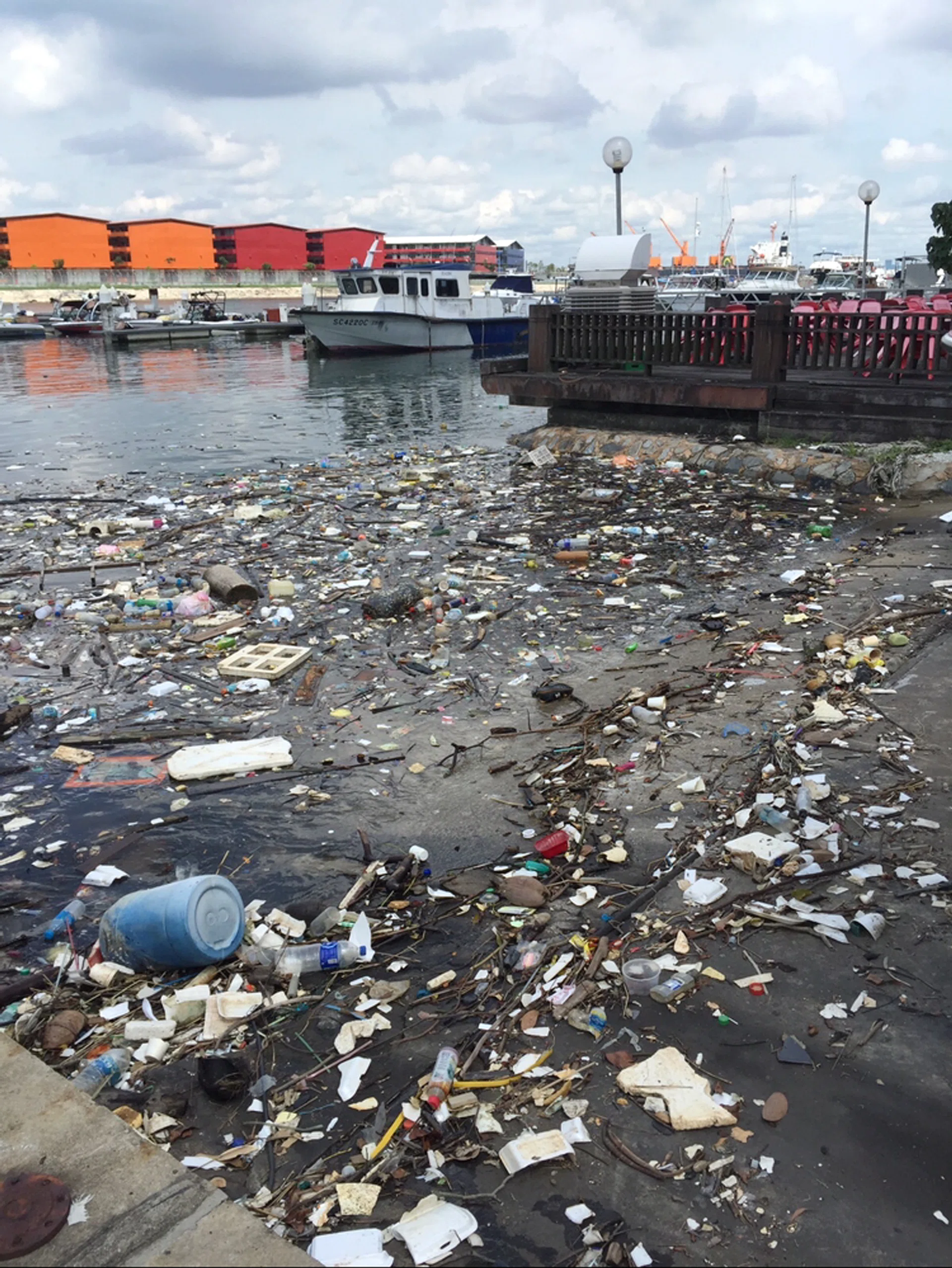 BEFORE & AFTER: A photo of the litter in the Punggol marina taken in November.