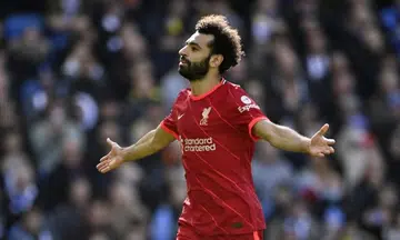 Liverpool sink Brighton to move within three points of Man City